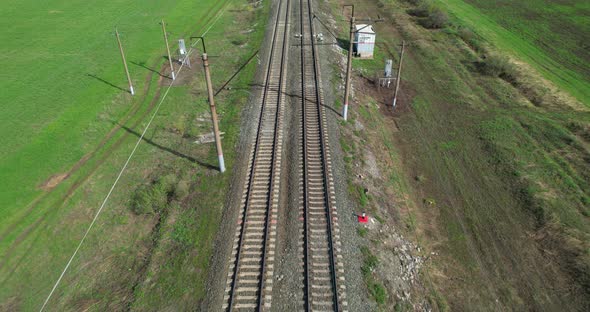 Railroad Tracks Going Into the Distance Aerial View alt