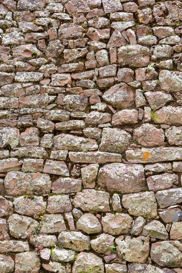 Inca wall made of stones in the Sacred Valley, Peru