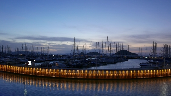 Yacht Marina By Night With Moored Sailing Boats