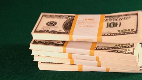 A Packs Of A One Hundreds Dollars Falls alt