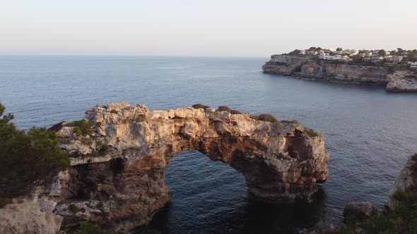Es Pontas Natural Stone Arch in Cala Santanyi in Mallorca or Majorca, Spain alt