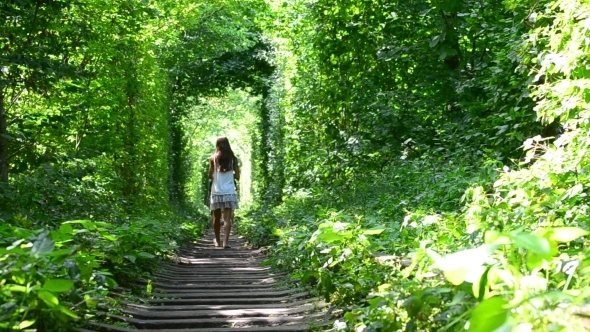 Young Slim Teenager Girl Walks Away From Camera In