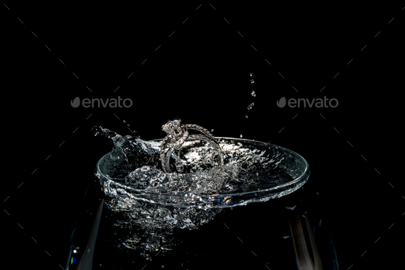 Wedding Rings Sinking in a cup of Water
