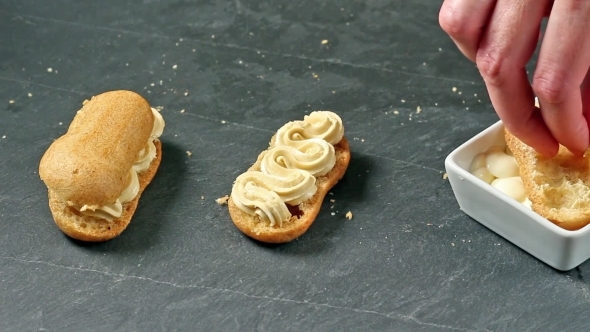 Frosting Two Eclairs