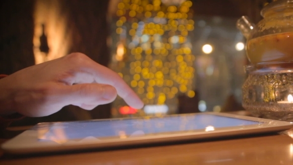 Close Up Man Hands Using Digital Tablet