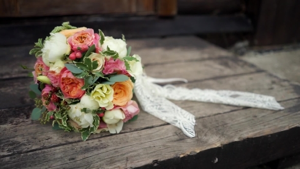 Wedding Bouquet On a Beautiful Wooden Surface