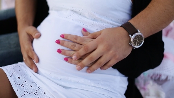 Hands Stroking Tummy Young Mother