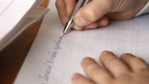 Pupil at the School Wrote on a Piece of Note Paper alt