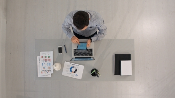 Businessman Working With Tablet Computer alt