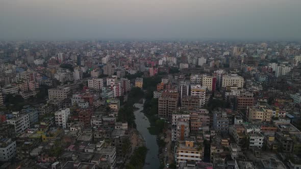 Smoggy air pollution hanging over Dhaka skyline, Bangladesh, drone view alt