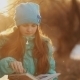 Beautiful Little Girl Reading In Winter Park - VideoHive Item for Sale