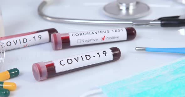 Blood Test Tube with COVID 19 Coronavirus