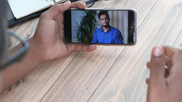 Businessman Working in Video Conference, Close Up. alt