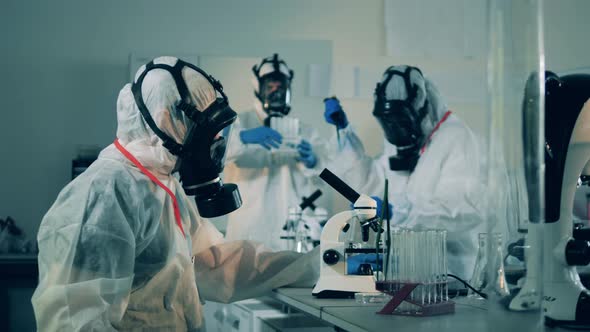 Group of Scientists Are Doing Research in the Laboratory. COVID-19 Laboratory, Coronavirus alt