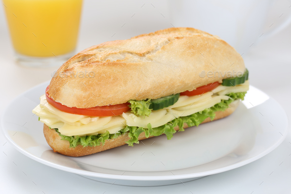 Sub deli sandwich baguette for breakfast with cheese and orange juice
