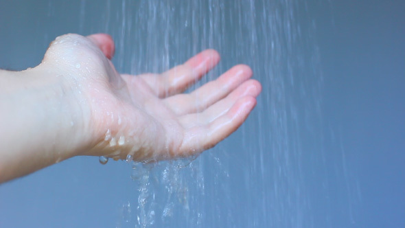 Man Washing His Hand In The Shower