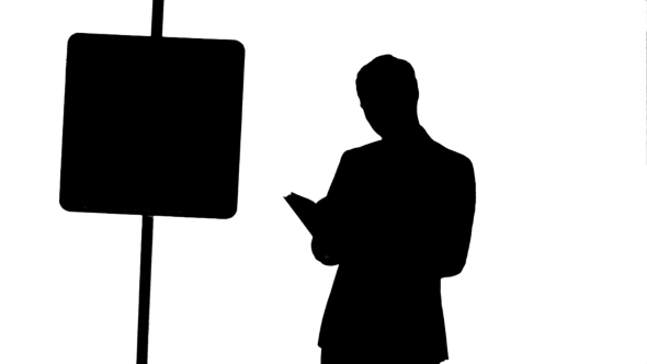 Silhouette Man Reading a Book With Parking Sign alt