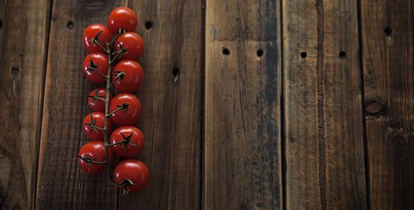 Red Cherry Tomatoes On Wooden Table Board