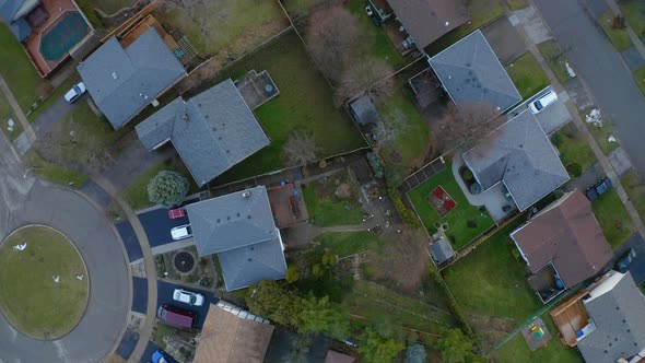 Topdown aerial drone view of houses and backyards in suburban neighbourhood of Kitchener, Ontario. alt