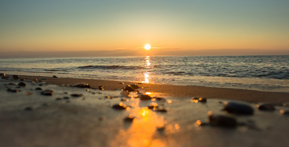 Sunset Over the Sea in Winter alt