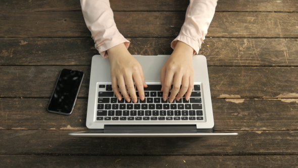 Typing Laptop Overhead View