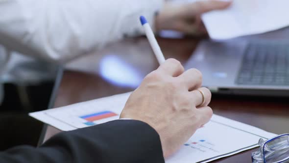 Male Politician Working on Election Campaign With Team, Checking Opinion Polls alt