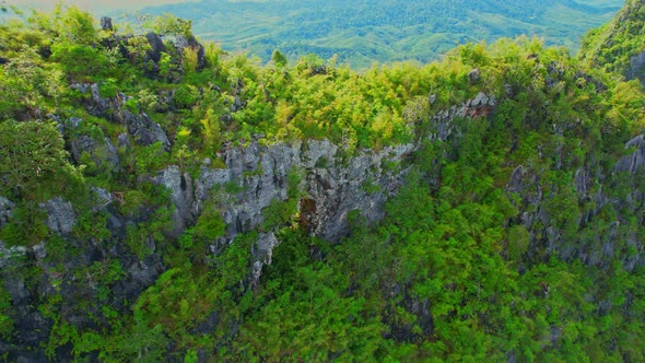 A drone is flying over "Khao Thalu" alt
