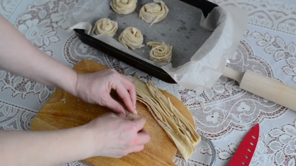 Housewife Preparing Bun Of Puff Pastry
