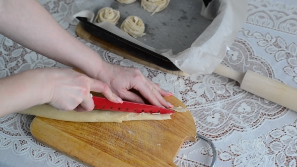 Housewife Preparing Bun Of Puff Pastry