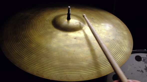 Close Up Drummer Playing on Drum Plate Ride alt