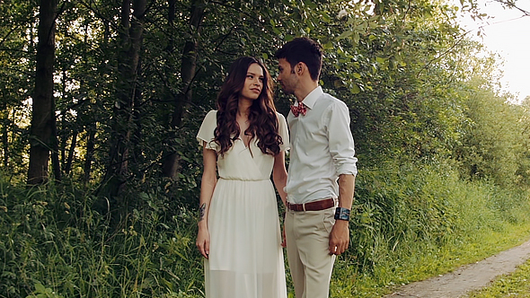 Couple Romantic Walking In The Forest