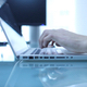 Software Engineer Typing on High-end Laptop on Glass Office - VideoHive Item for Sale