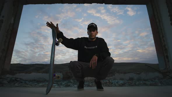 Skater with his skateboard alt