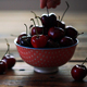 Red Cherries In Bowl On Wooden Table - VideoHive Item for Sale