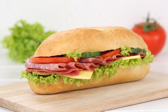 Sub deli sandwich baguette with salami ham for breakfast