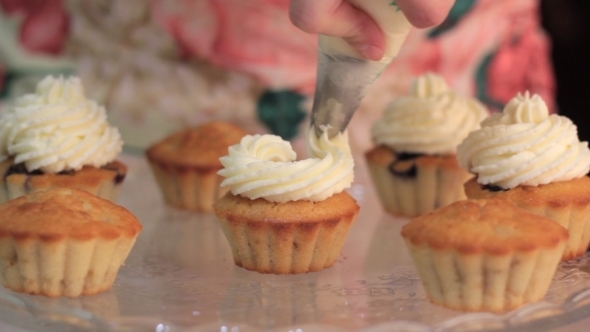 Chef Is Decorating Cupcakes For a Party