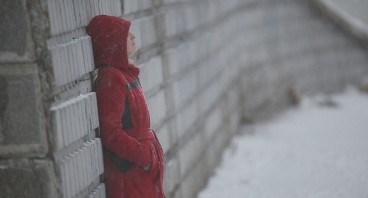 A Girl Walks in Winter