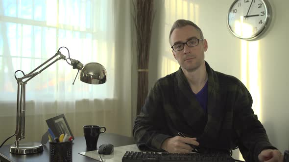 Working At His Office Desk 4 alt