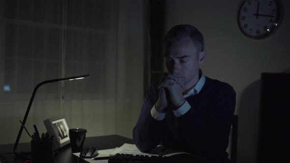 Sad Man At His Office Desk 2 alt