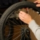 Bike Maintenance. The Young Man Tightens The Spokes On The Bicycle Wheel. - VideoHive Item for Sale