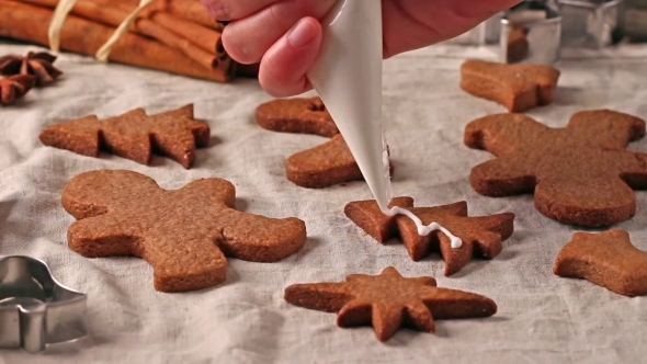 Making And Glazing Christmas Cookies With Cookie Cutters