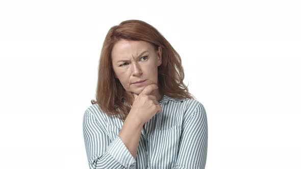 Woman Thinking with Serious Determined Expression Touching Lip As Pondering Resolve Searching alt