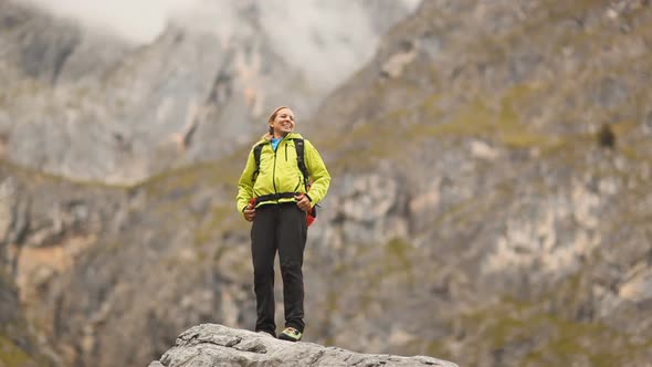 Woman After Reaching Mountaintop alt