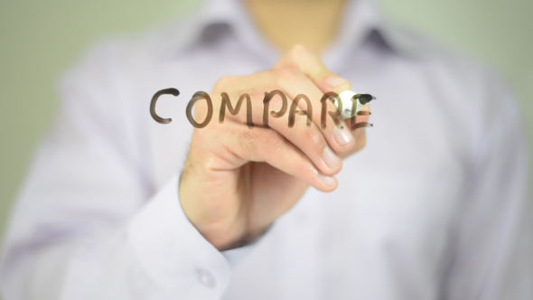 Compare,  Man Writing on Transparent Screen alt