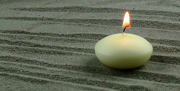 Candle on the Sand
