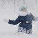 Lovely Little Girl Throwing a Handful Of Snow Up - VideoHive Item for Sale