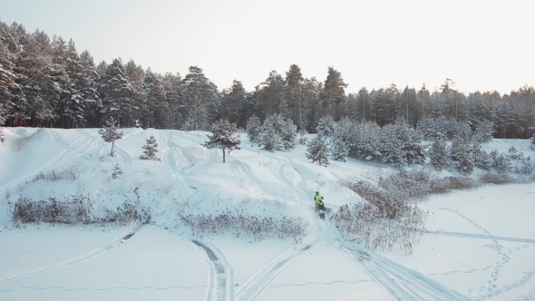 Winter Fun On Snowmobiles alt