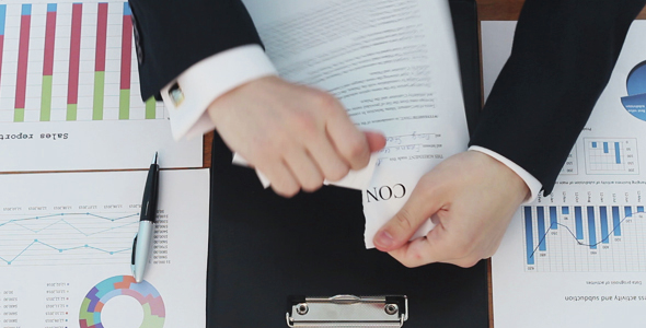 Businessman Tearing Contract alt