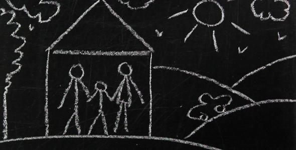 Drawing on A Blackboard Person Drawing a family on The Board.