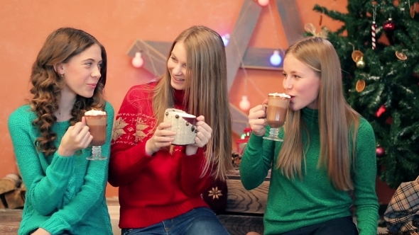 Three Young Girls Drinking Coffee